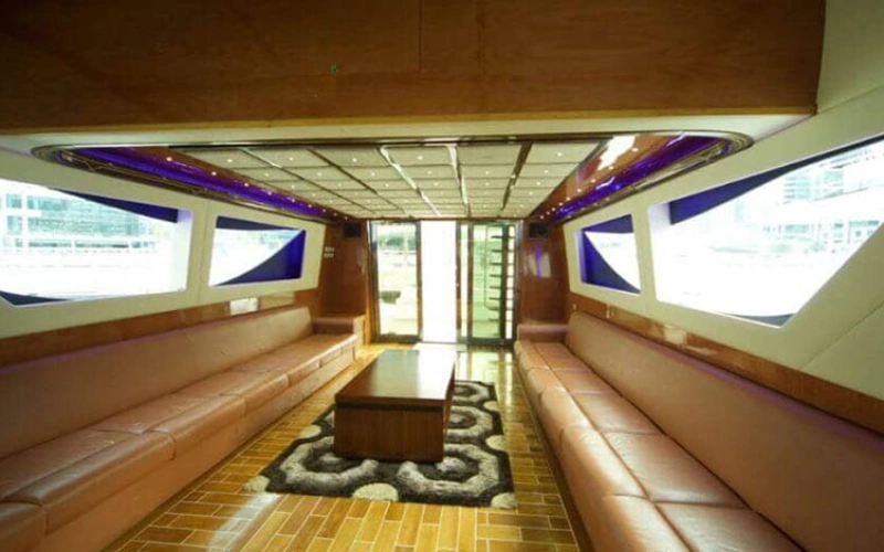 Luxurious lounge on 75ft Al Wasmi Yacht – yacht rental Dubai by Mala Yachts