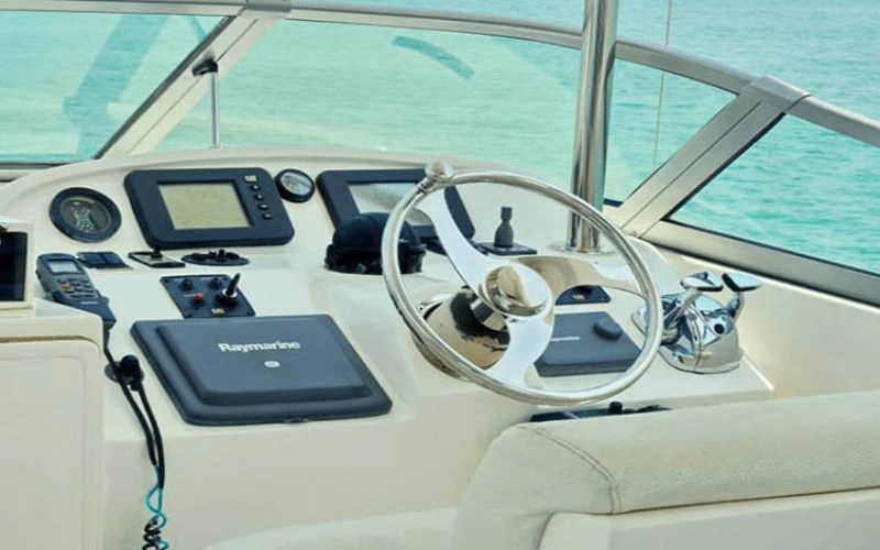 Modern captain’s control area on Gulf Craft 55ft yacht – yacht rental Dubai by Mala Yachts