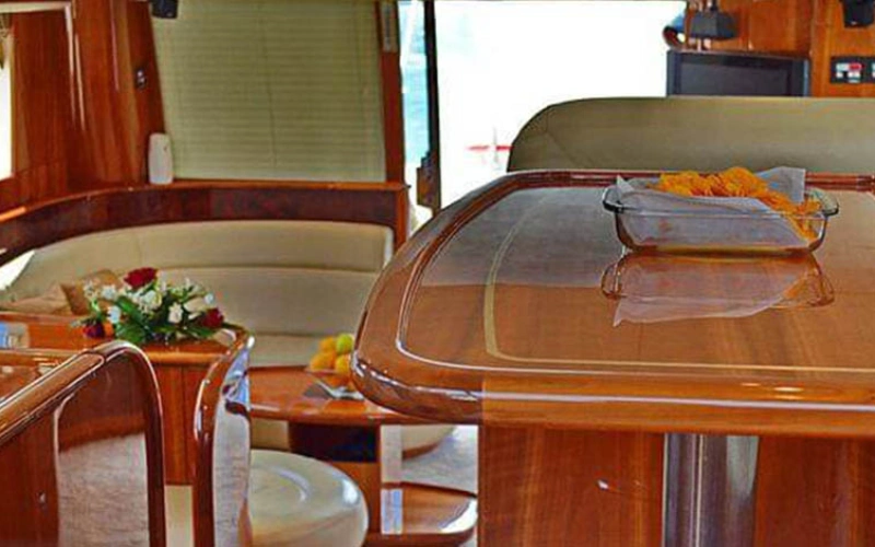 Comfortable indoor seating with modern décor – Mala Yachts yacht rental in Dubai
