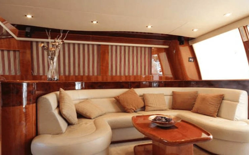 Plush sofa seating in the lounge of Gulf Craft 55ft yacht – yacht rental Dubai by Mala Yachts