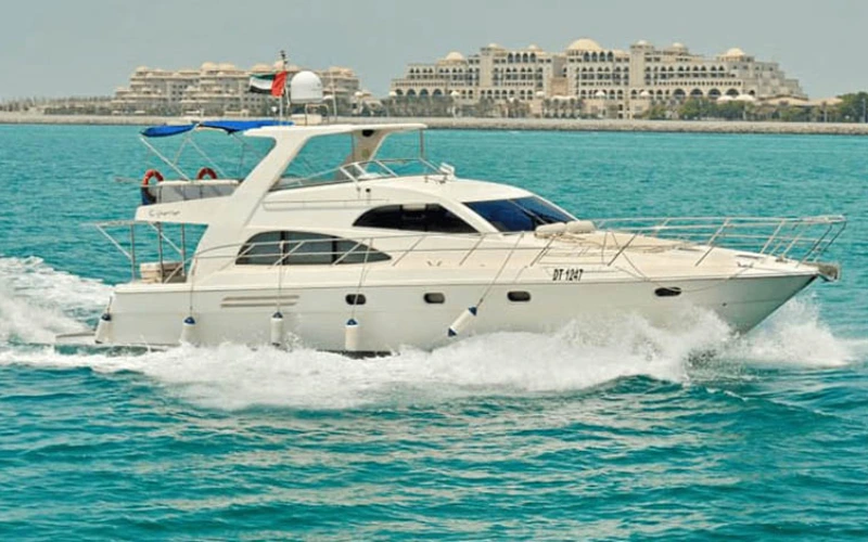 Sleek exterior of Gulf Craft 55 yacht cruising in Dubai – yacht rental Dubai | Mala Yachts