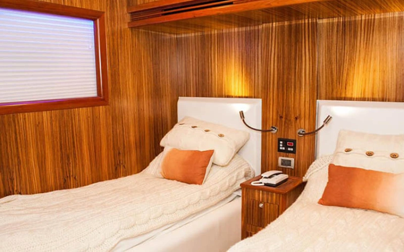 Stylish twin bedroom onboard 82ft yacht – Mala Yachts yacht rental in Dubai