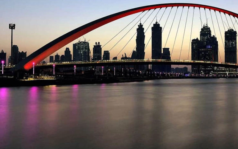 Evening skyline view from El Mundo Yacht deck – Mala Yachts yacht rental in Dubai