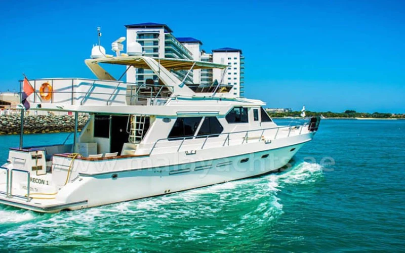 Sunset backdrop on 62ft yacht’s exterior – yacht rental in Dubai | Mala Yachts