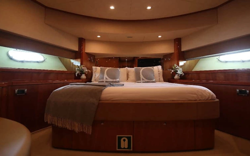 Cozy bedroom onboard Daydream Yacht – yacht rental Dubai with Mala Yachts