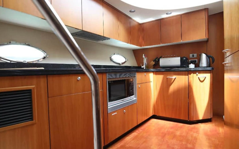 Fully equipped kitchen on Daydream Yacht – yacht rental Dubai by Mala Yachts