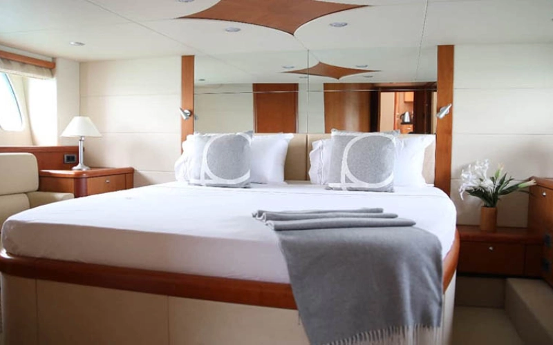 Master bedroom onboard Daydream Yacht – yacht rental Dubai by Mala Yachts