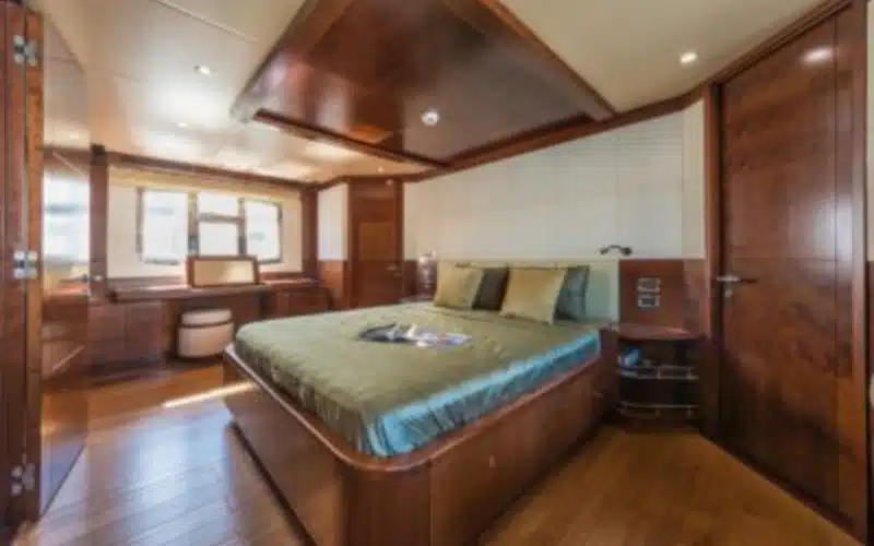 "Spacious twin-bed cabin aboard Majesty Emerald 88 Yacht – ideal for overnight yacht rental Dubai with Mala Yachts."