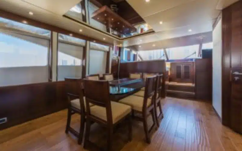 "Luxurious salon inside Majesty Emerald 88 Yacht by Mala Yachts – elegant setting for yacht rental Dubai."