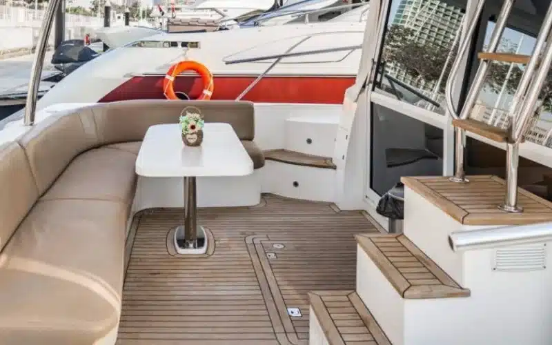 "Elegant sitting area on Majesty 48 Yacht – relax and enjoy premium yacht rental Dubai by Mala Yachts."