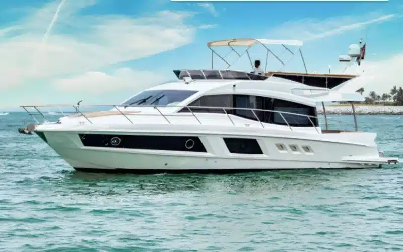 "Front deck sunbed area of Majesty 48 Yacht – enjoy open sea views with yacht rental Dubai."