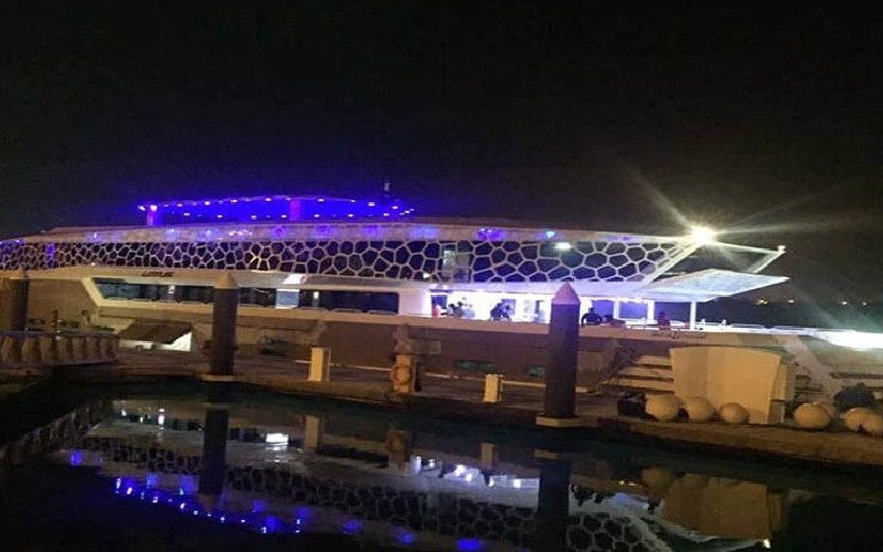 Side profile of Lotus Mega Yacht – iconic yacht rental Dubai experience from Mala Yachts.