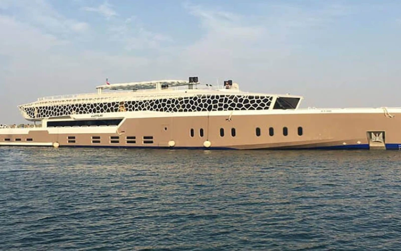 Lotus Mega Yacht sailing in Dubai Marina – exclusive yacht rental Dubai experience with Mala Yachts.
