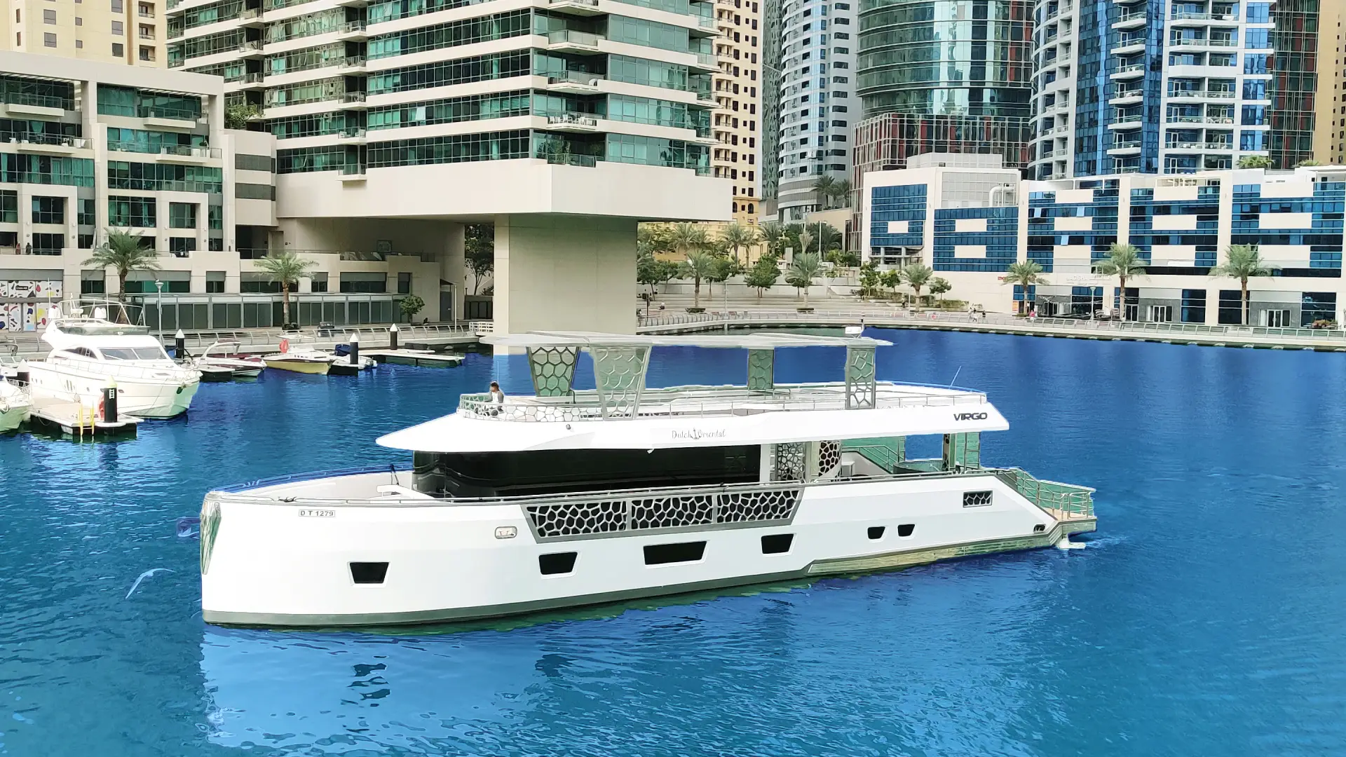 Aft deck on Virgo Yacht featuring an outdoor dining setup – dine under the stars with Mala Yachts yacht rental in Dubai