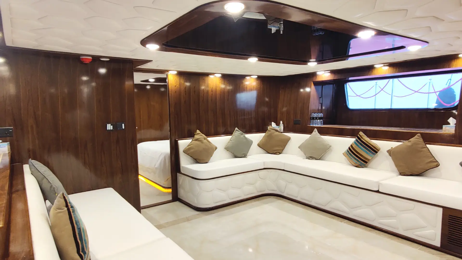 "Luxurious single sofa setup on the Virgo Yacht by Mala Yachts, offering comfort and style for an unforgettable yacht rental Dubai experience — perfect for premium yacht rental in Dubai."