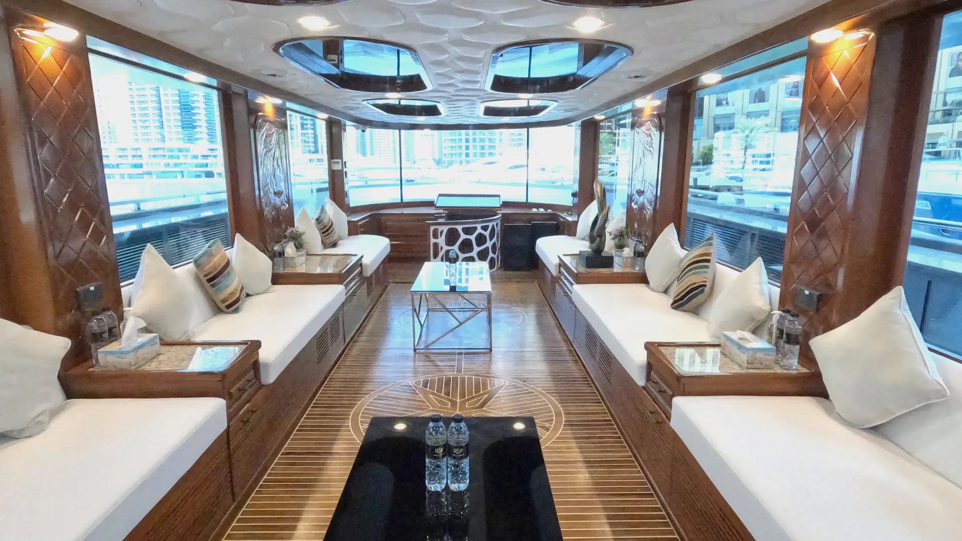Elegant salon on Virgo Yacht featuring ambient lighting and luxury interiors – experience yacht rental in Dubai with Mala Yachts