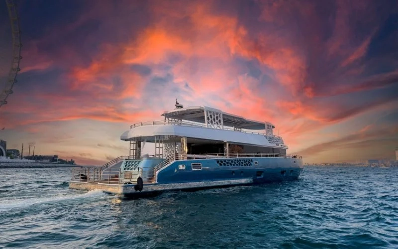 Sun deck on Arabian Pearl Yacht with loungers and sea views – unwind under the sky with yacht rental Dubai by Mala Yachts