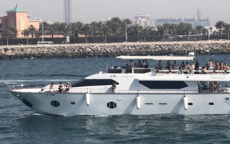 Ocean Pearl Yacht cruising through Dubai waters – a striking presence by Mala Yachts yacht rental in Dubai