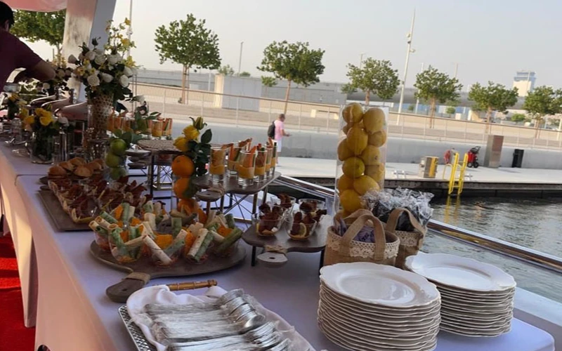 Elegant dining room inside 141ft yacht set for fine dining at sea – part of Mala Yachts premium yacht rental Dubai service