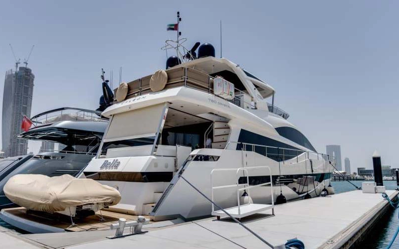 Backside view of 78 Feet Yacht with spacious outdoor deck and stairs – offered by Mala Yachts yacht rental in Dubai