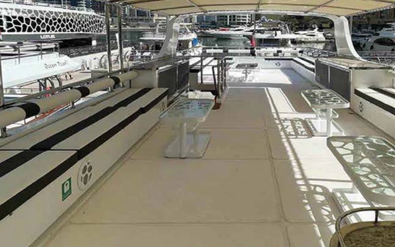 Luxurious lounge area inside Apollo 85ft yacht with elegant décor – available with Mala Yachts yacht rental in Dubai