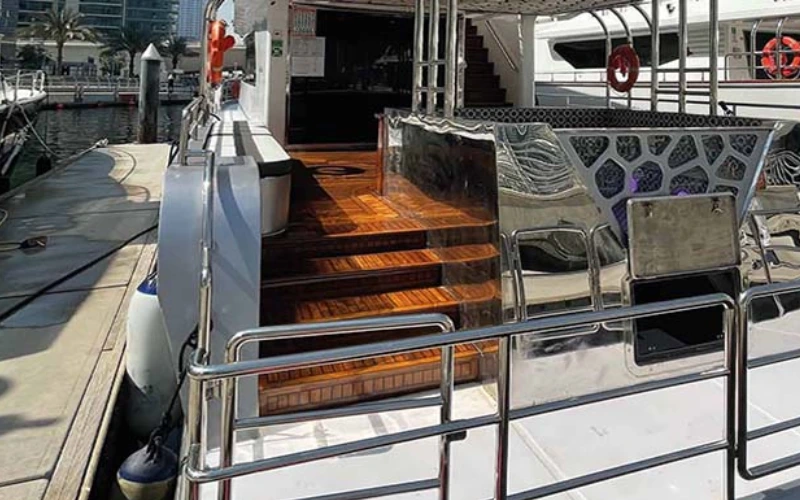 Elegant indoor lounge aboard Apollo 85ft yacht with comfortable seating and refined finishes – offered by Mala Yachts yacht rental in Dubai