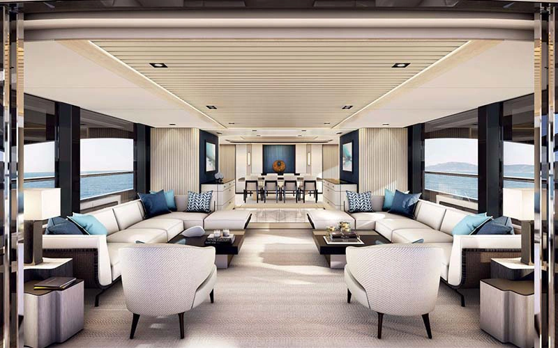 Spacious lounge area aboard Code 8 yacht with ambient lighting and luxurious sofas – part of Mala Yachts’ yacht rental in Dubai