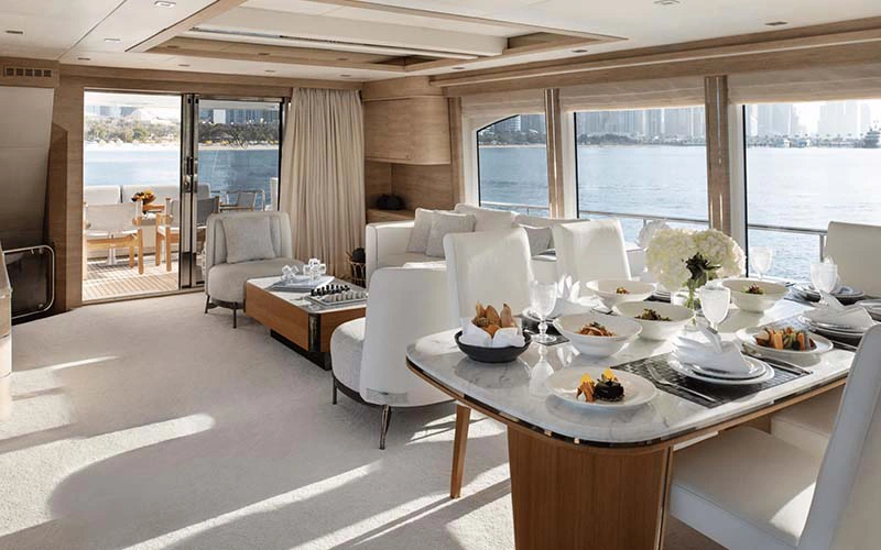 Modern lounge area inside Haigan 90ft yacht with ambient lighting – available with Mala Yachts’ premium yacht rental in Dubai