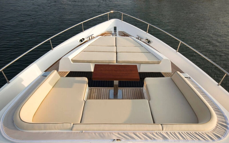 Upper deck of Galeon Yacht with open-air seating and panoramic ocean view
