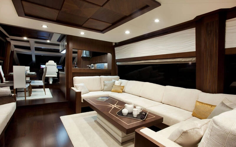 Indoor lounge area with cushioned seating and overhead lighting on Galeon Yacht