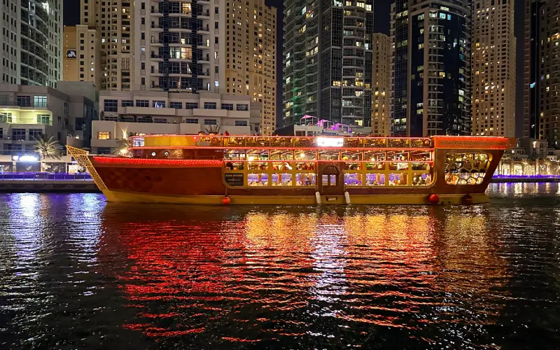 Docked Ocean Empress Dinner Cruise ready for boarding, with welcoming lights and grand appearance