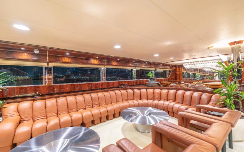 Luxury sofa seating in the main salon of 151ft Yacht with soft cushions and modern design