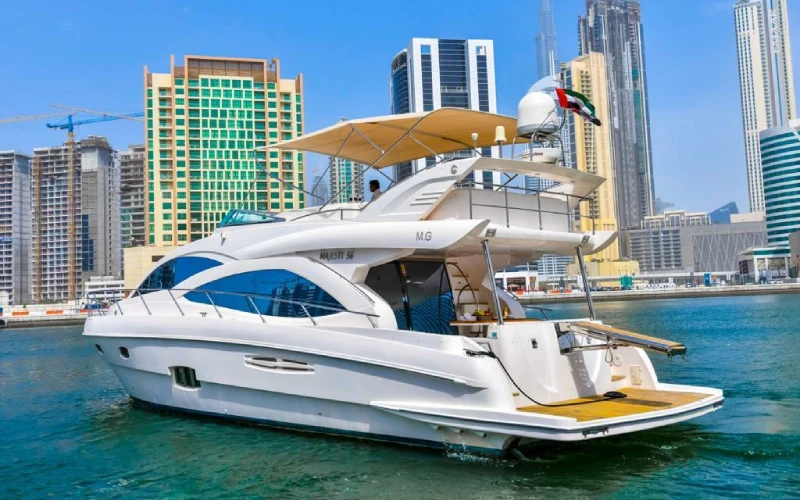Rear view of Silver Queen Yacht showing swim platform and outdoor deck with seating area