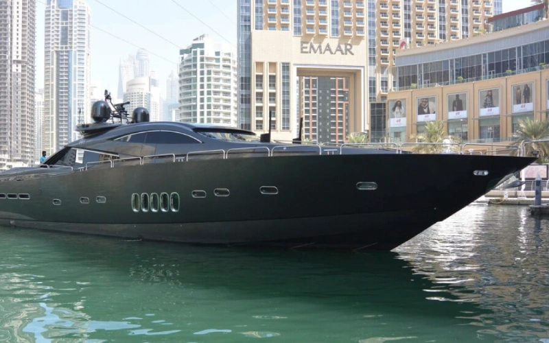 Rear exterior of Black Beauty Yacht showing open deck space and stylish swim platform