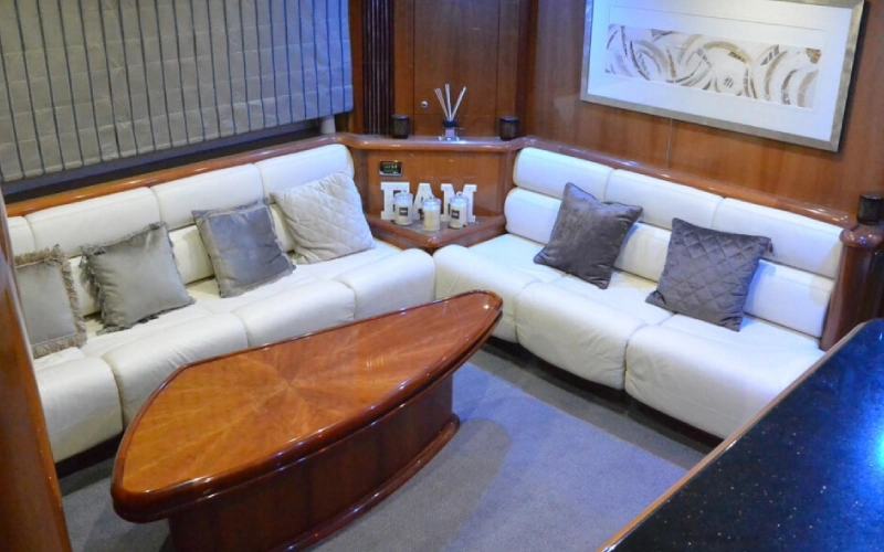 Rear deck of Black Beauty Yacht with open-air seating perfect for relaxing and enjoying the sea breeze