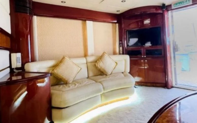 Spacious salon on Majesty 77ft Yacht featuring twin sofas and large side windows