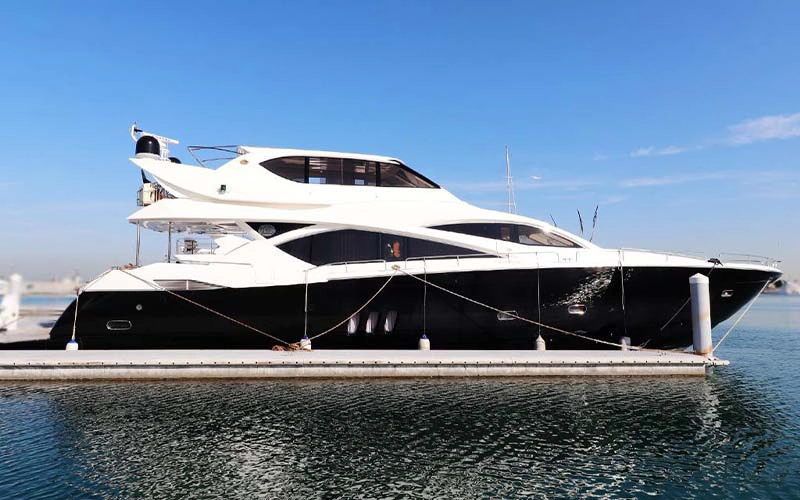 Backside of SunSeeker Yacht showcasing open deck space and stylish swim platform