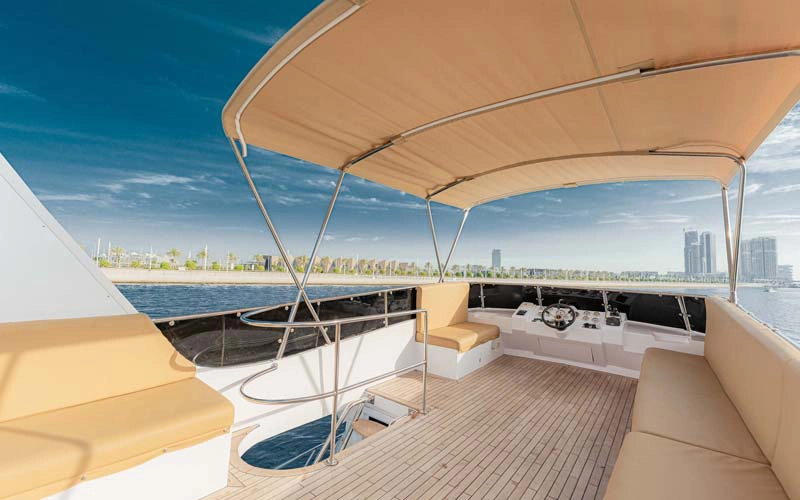 Back view of Sasmi 50 yacht with swim platform and open-air relaxation space