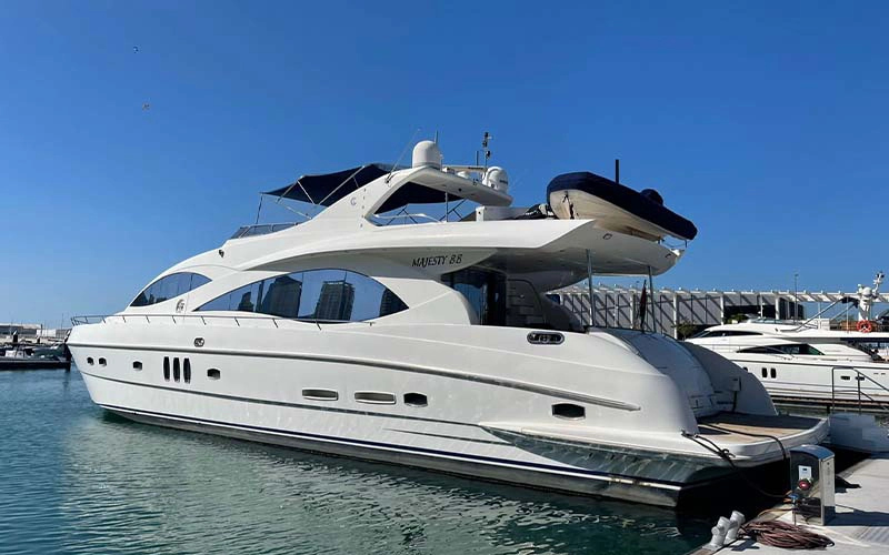 Open upper deck on Lady of the Sea yacht with lounge seating and scenic views