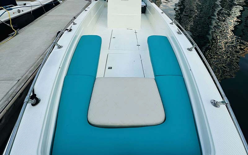 Stylish lounge area inside Mermaid Yacht with plush seating and panoramic windows