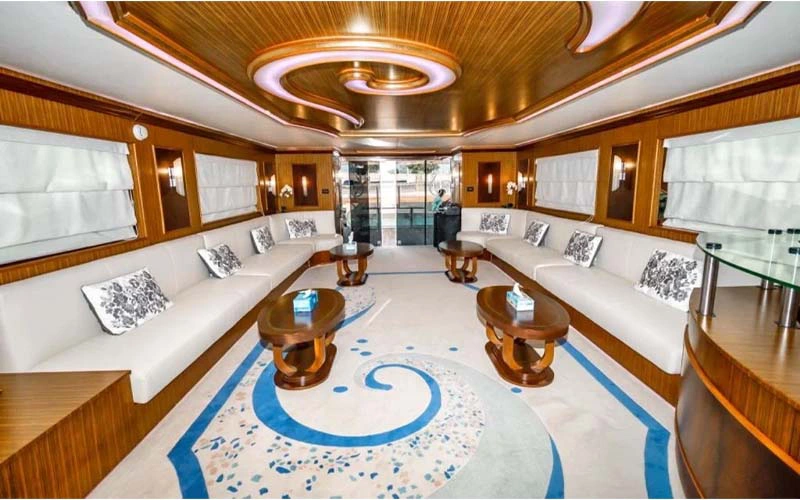 Dining area on Black Berry Yacht featuring elegant setup with wood finishes