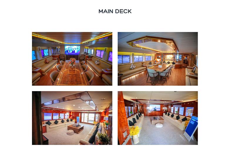 Spacious indoor lounge on Mazayal Yacht with stylish seating and natural lighting