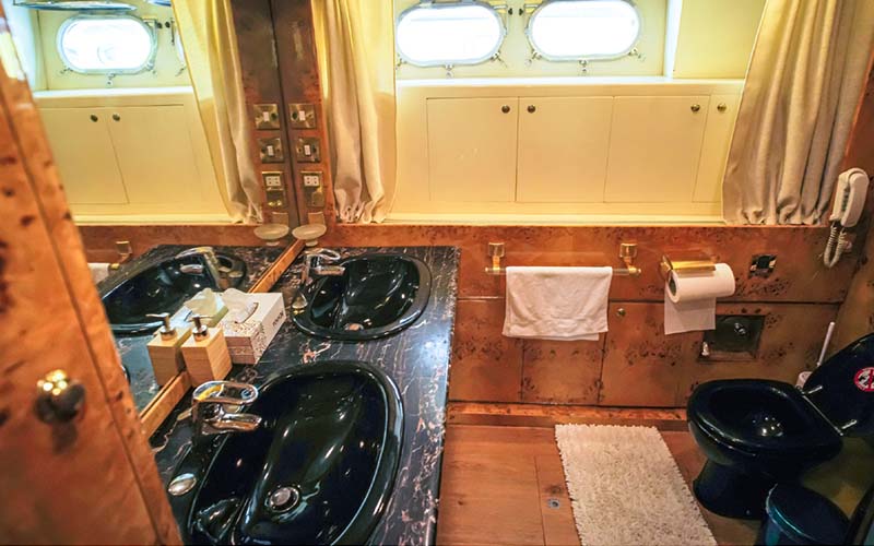 Modern bathroom on Mazayal Yacht featuring sleek fixtures, glass shower, and marine-style design