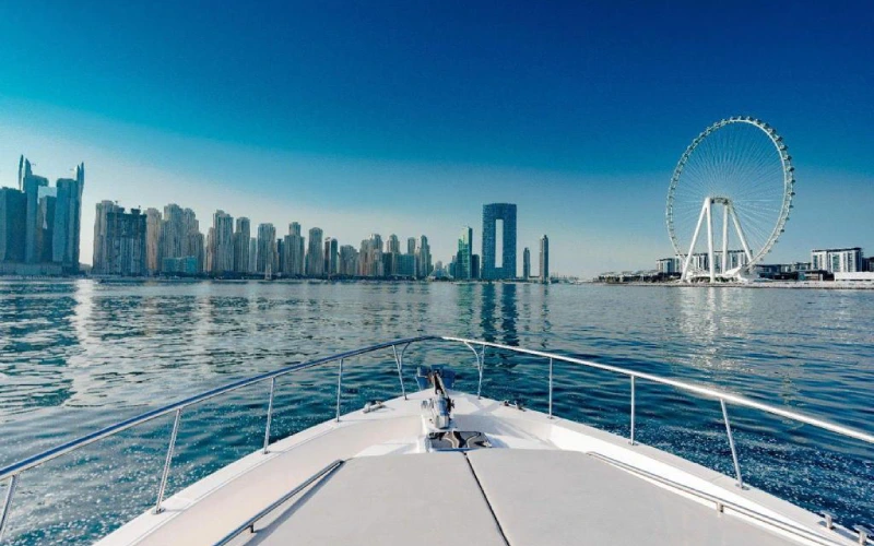 Spacious outdoor deck of Ocean Seeker 2 Yacht featuring cushioned seating, teak flooring, and open sea views—perfect for sunbathing or al fresco dining