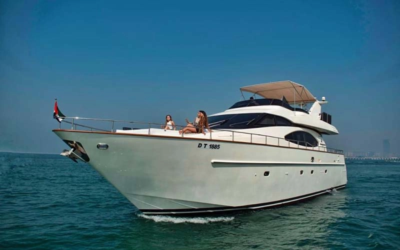 Speed Rock Yacht speeding across turquoise Dubai waters with a sleek, streamlined profile