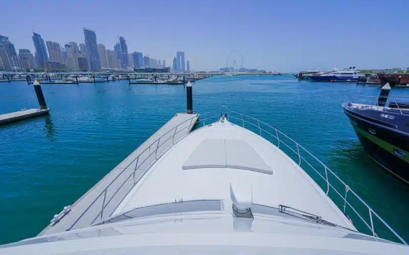 Upper deck of Sea Fish Yacht featuring a shaded lounge area with cushioned seating, open views of the sea, and ideal setup for fishing or sunset relaxation