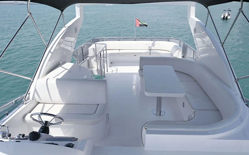 Captain’s helm station with dual navigation displays and leather seating on Maze Yacht