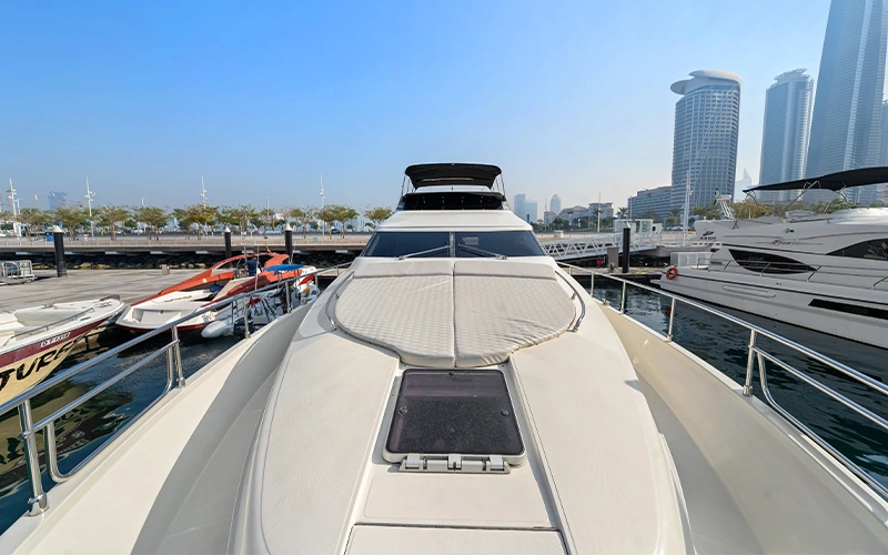 Lava Yacht docked at Dubai Harbour with its elegant profile and modern flybridge design