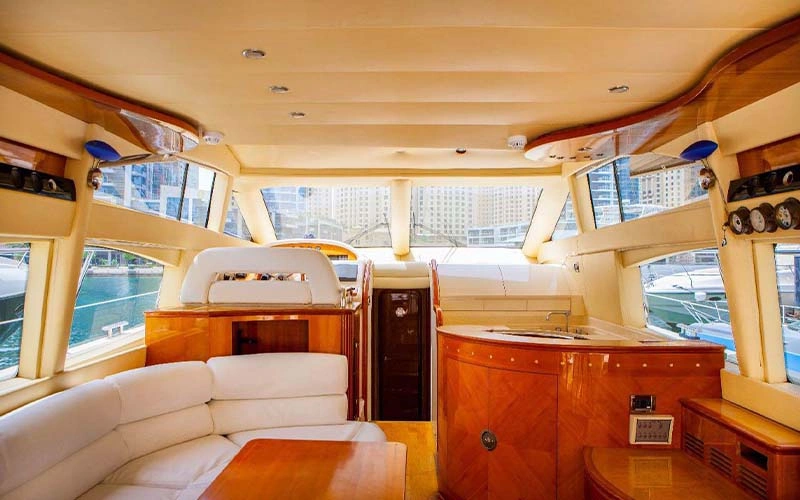 Elegant master cabin aboard Major Yacht featuring a super‑king bed, high-end furniture, and soft lighting
