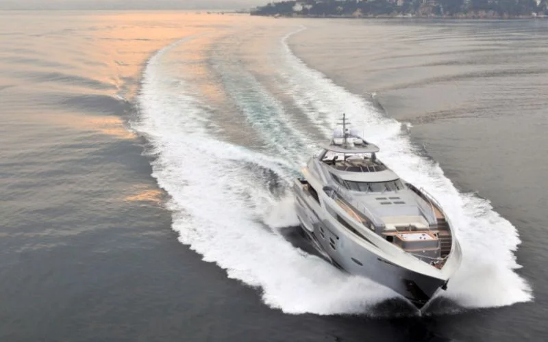 "Santorini Silver yacht sailing across Dubai Marina – Mala Yachts premium yacht rental in Dubai"